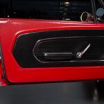 Driver's door panel of the 1967 Ford Mustang Fastback 501 Pro-Touring in restored black vinyl trim, showing the clean period-correct interior finish of this show-quality Pro-Touring build