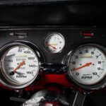 Close-up of the custom JME Autometer gauge cluster in the dashboard of the 1967 Ford Mustang Fastback 501 Pro-Touring, providing accurate readouts for the high-performance 501 CID drivetrain