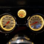 Lit-up: Close-up of the custom JME Autometer gauge cluster in the dashboard of the 1967 Ford Mustang Fastback 501 Pro-Touring, providing accurate readouts for the high-performance 501 CID drivetrain