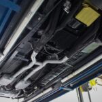 Mustang II Pro-Touring front subframe with tubular upper and lower control arms on the 1967 Ford Mustang Fastback 501, providing modern handling geometry and front disc brake capability