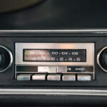Factory U69 AM-FM pushbutton radio in the dashboard of the 1972 Chevrolet Camaro RS/SS 396, original factory-installed unit in working condition