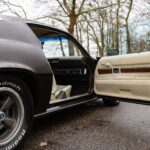 Passenger door panel interior of the 1972 Chevrolet Camaro RS/SS 396 in original Z87 Custom Interior brown trim, unrestored survivor condition
